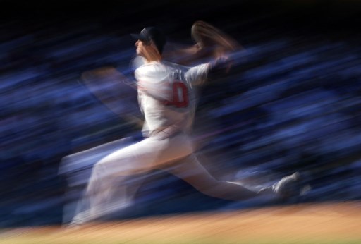勇士先發投手派出摩頓(Charlie Morton),今年季後賽防禦率3.77,每場最多失分就是兩分。法新社