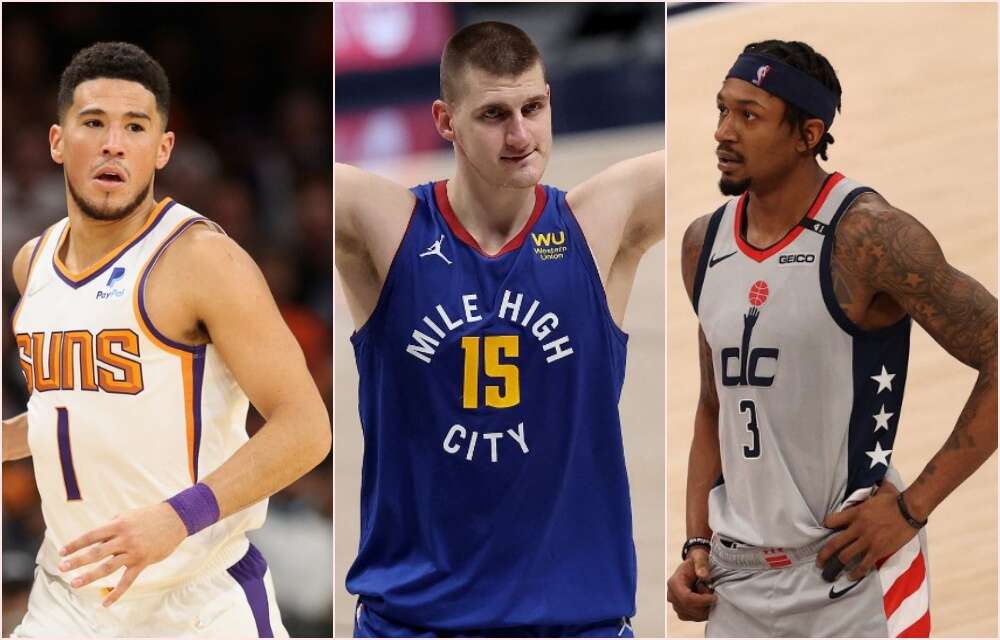 布克(左起)、約基奇、比爾與東家續約都破2億美元,後兩人更刷新NBA紀錄。(法新社資料照)