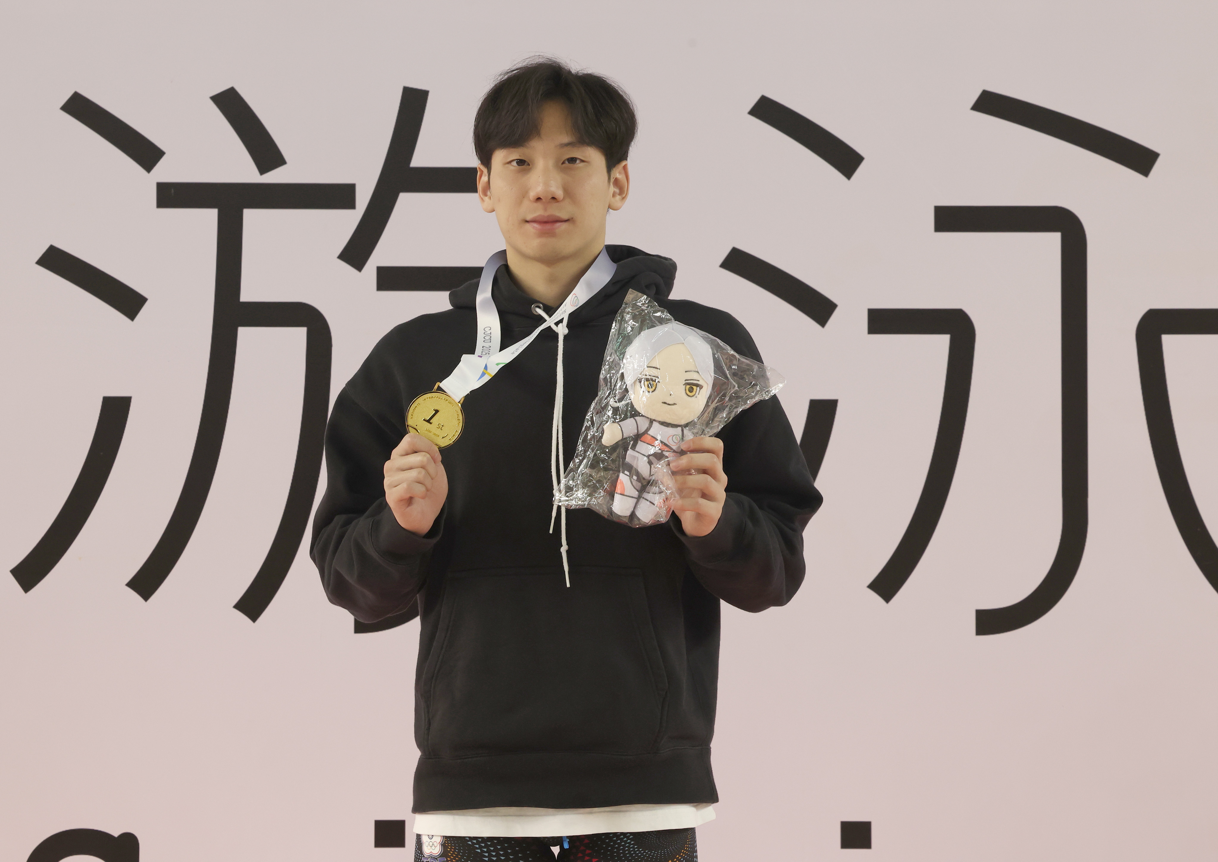 王冠閎第一次在全大運挑戰50蝶就破全國紀錄。大會提供