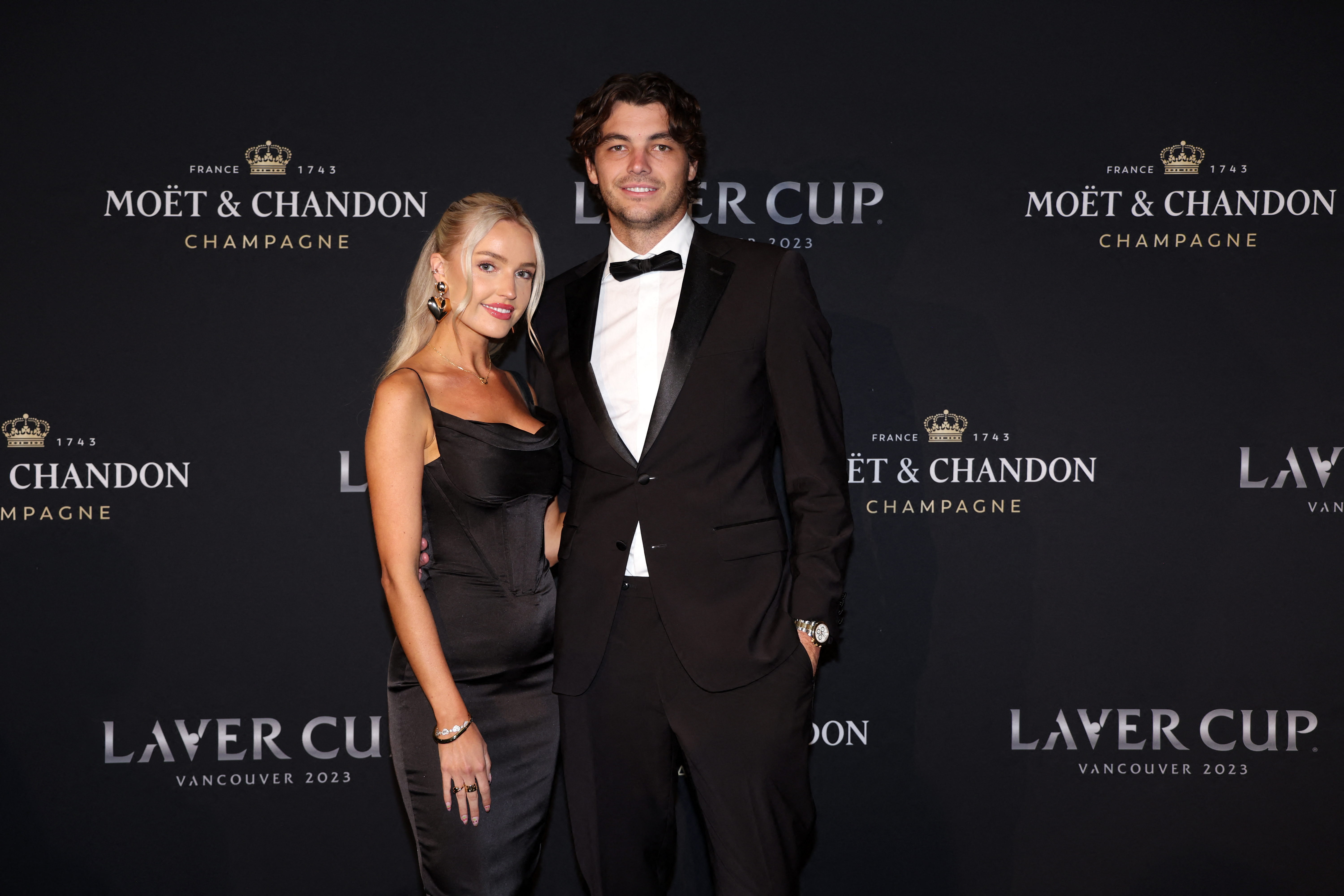 弗里茨(Taylor Fritz,右)與女友摩根里德(Morgan Riddle)已經成為職網著名的情侶檔。法新社