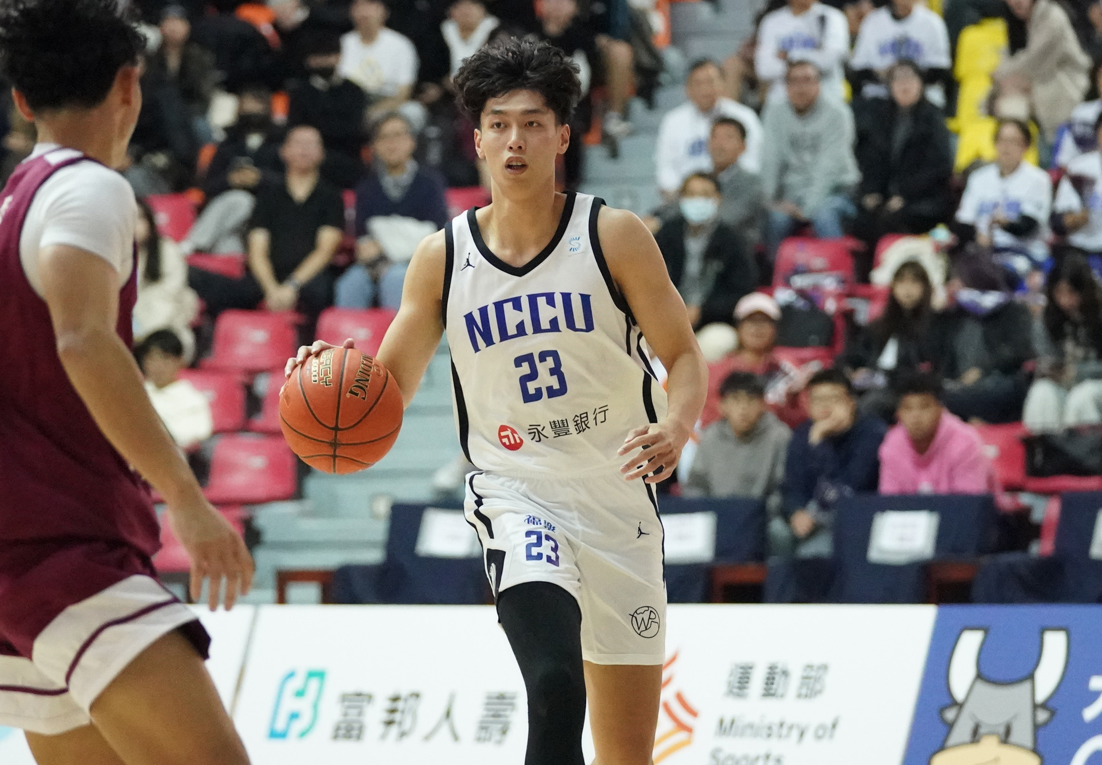 政治大學吳志鍇攻下全隊最高22分含六記外線並抓下10顆籃板。大專體總提供