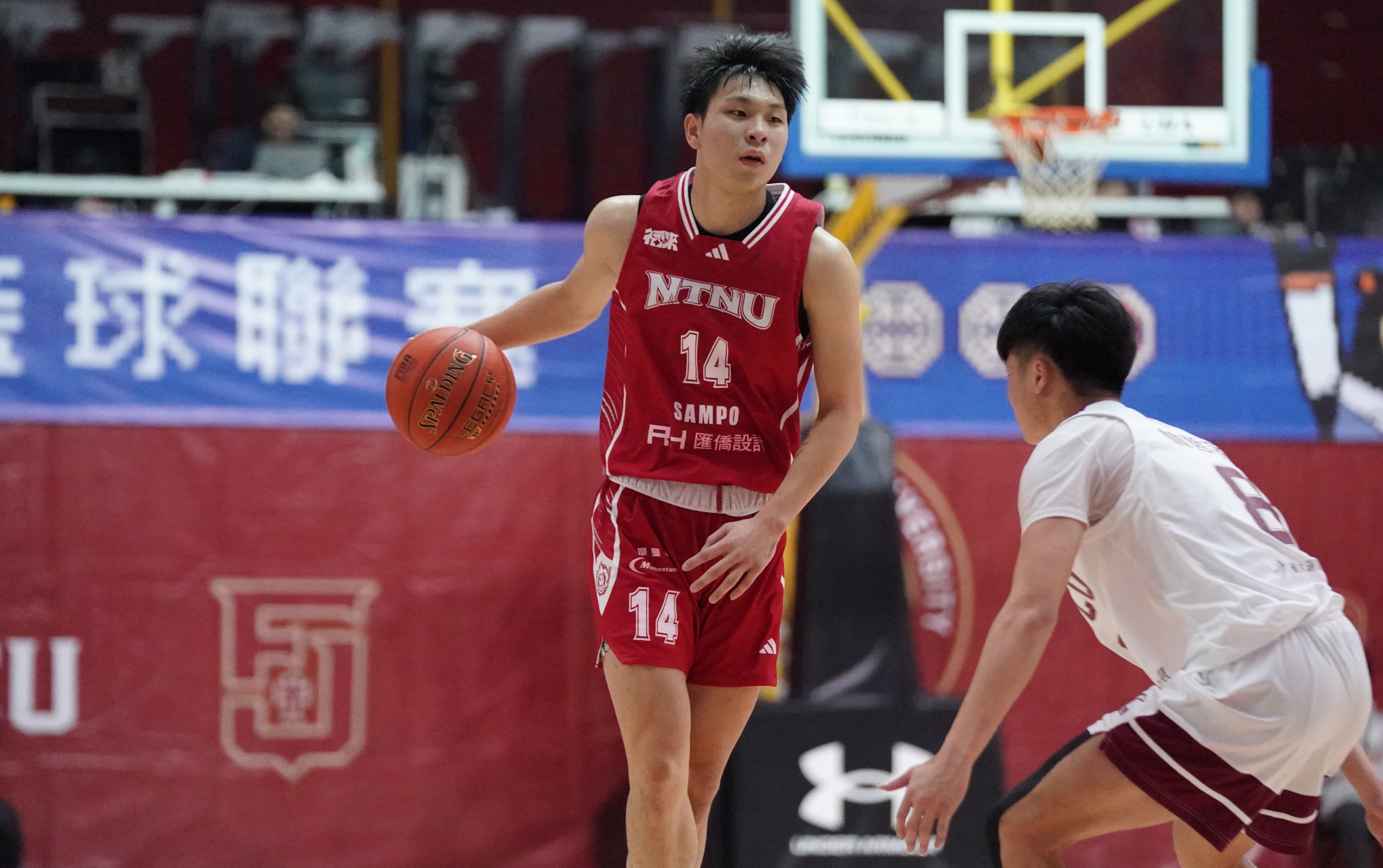臺灣師大莊政隆14分15籃板雙十另有7助攻5抄截的表現。大專體總提供