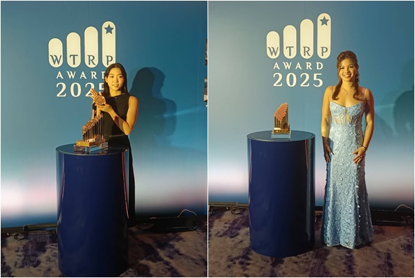 獲百萬獎金的游泳選手韓安齊(右)、張雅佳盛裝出席。詹健全攝