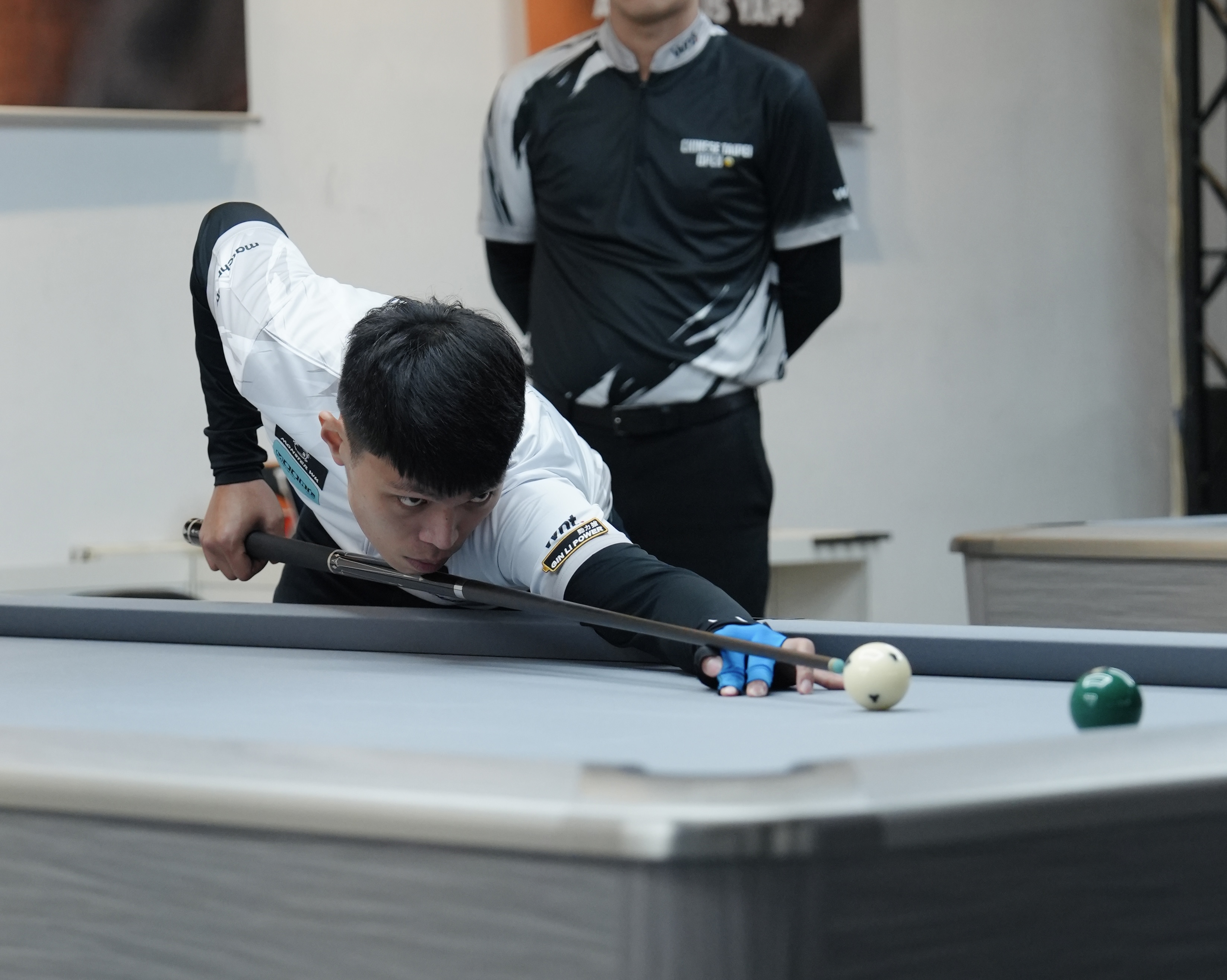 謝佳臻小心翼翼控制擊球力道。大會提供