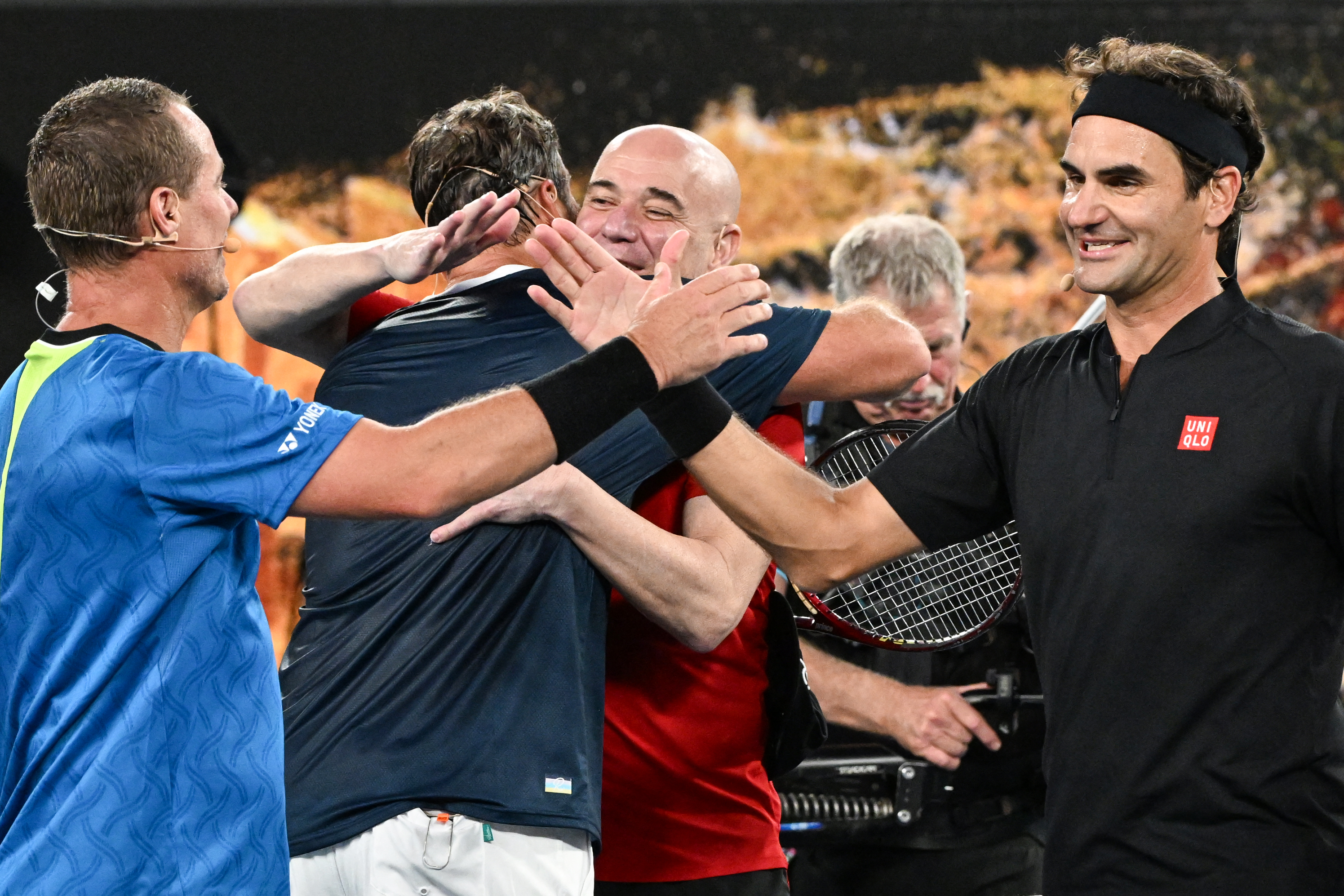 費德勒(右1)重返澳網獲得不少的矚目。法新社