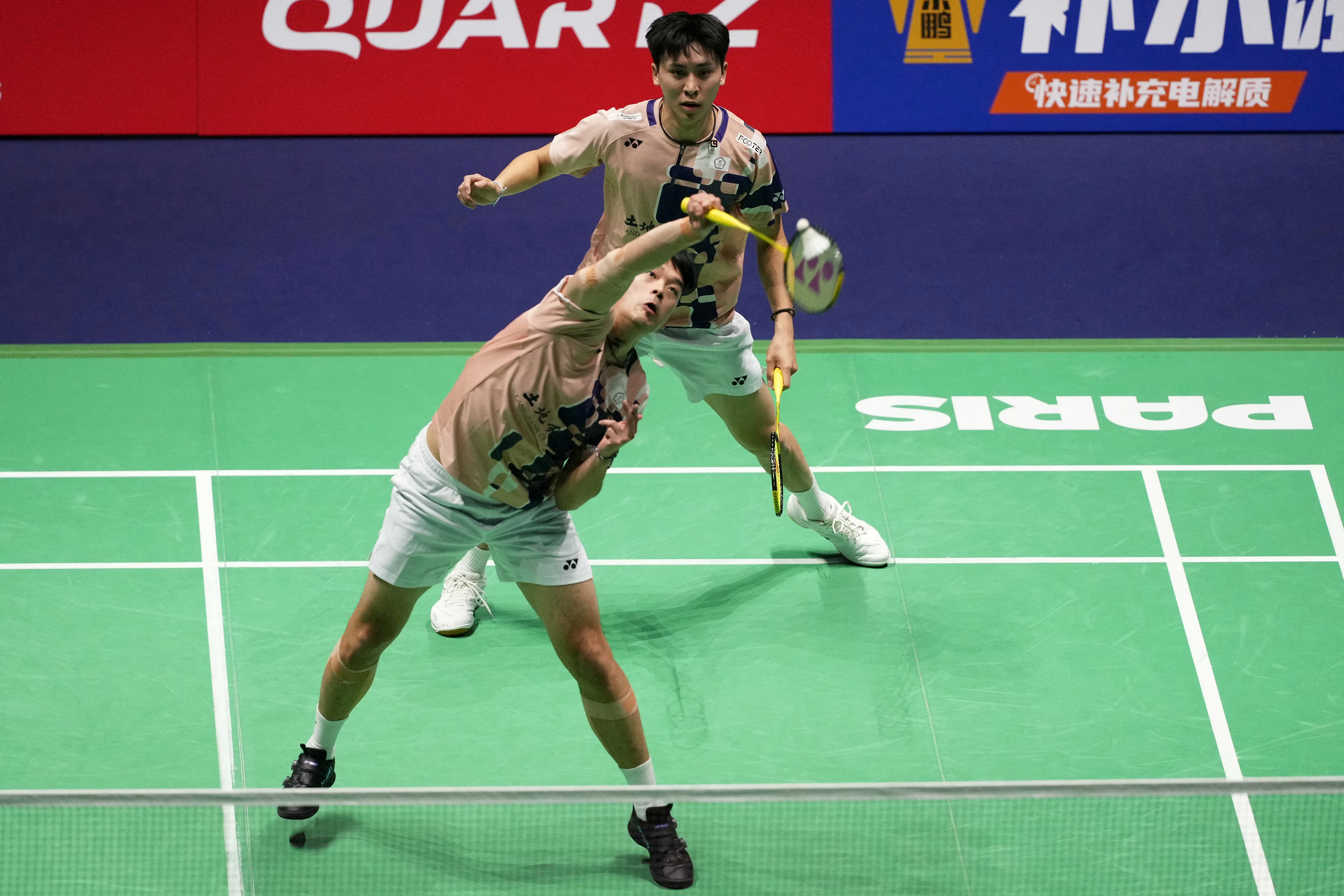 王齊麟／邱相榤三局惜敗。法新社