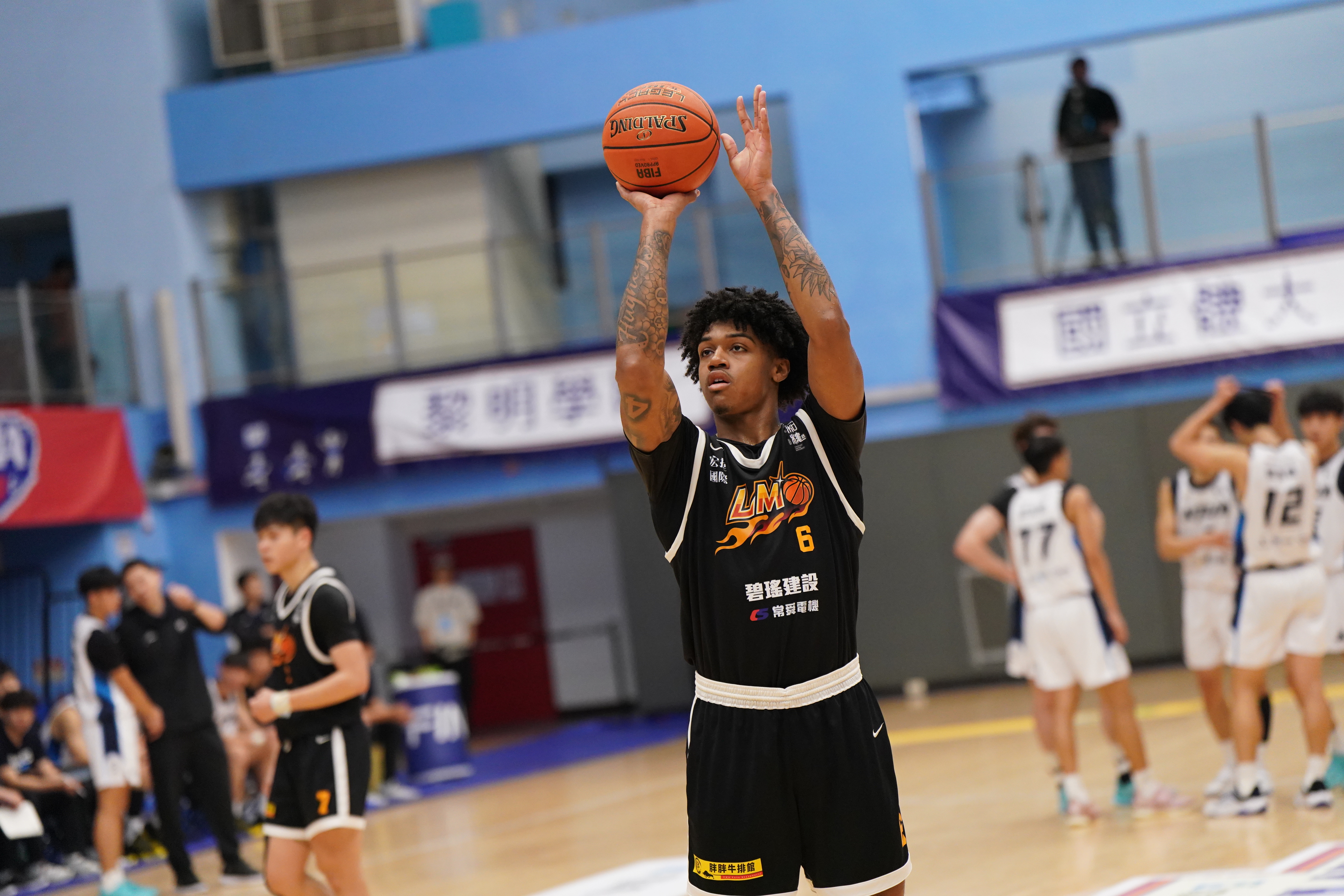 黎明學院泰力17分14籃板。大專體總提供