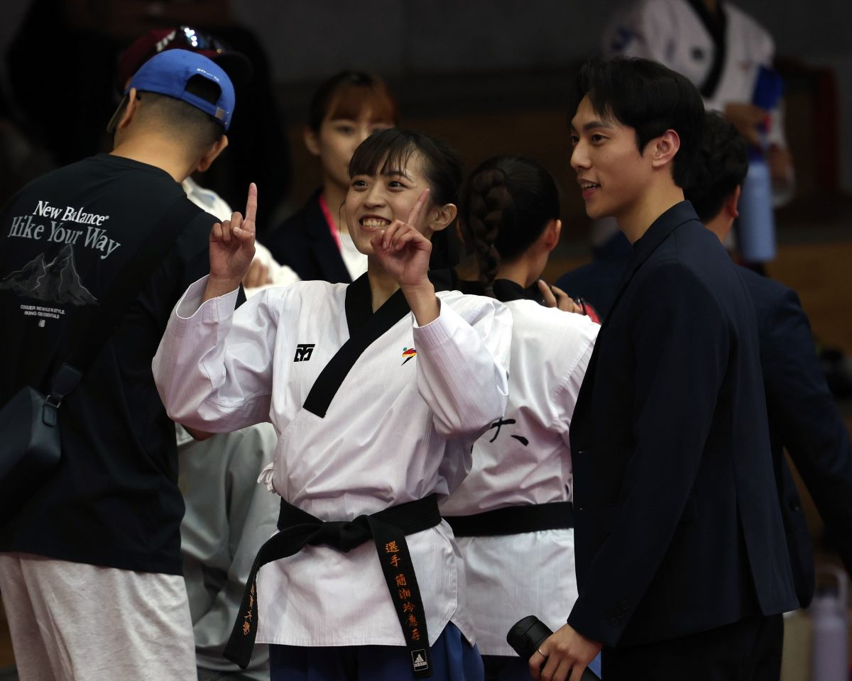 國立體大簡湘玲（左）與教練馬允中。全大運辦公室提供