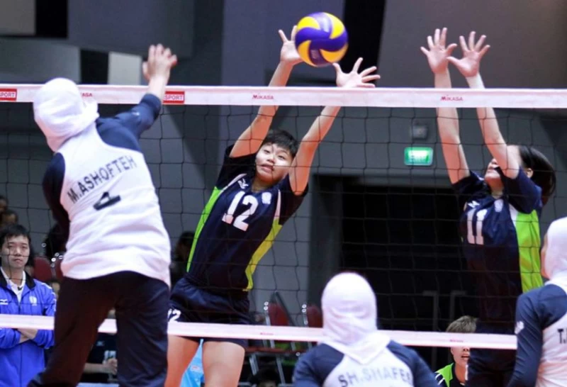 中華隊林書荷(左起)、魏璽格攔網。圖／SMM Volley。