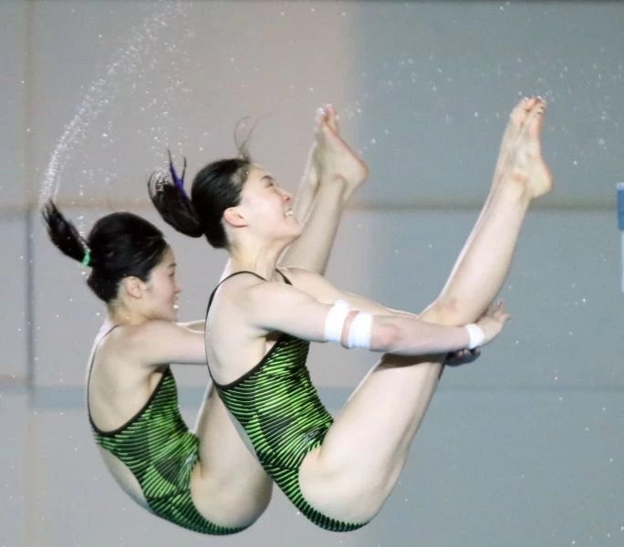 韓國隊HYEON_GYEONG_JODA_YAON_JUNG_在世大運測試賽女子雙人跳臺有精彩表現。圖/大會提供