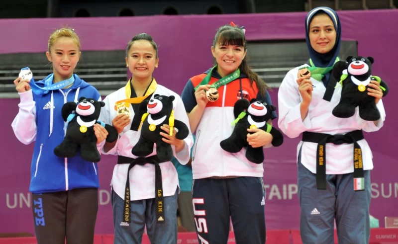 臺北世大運跆拳道賽事,女子個人品勢得牌選手合影。圖/台北世大運執委會提供