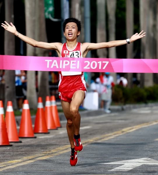 臺北世大運男子半馬金牌,日本片西景以1小時06分09秒率先抵達終點。台北世大運組委會提供