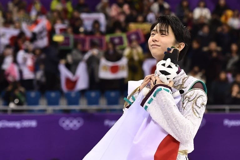 羽生結弦受傷復出奪金。法新社