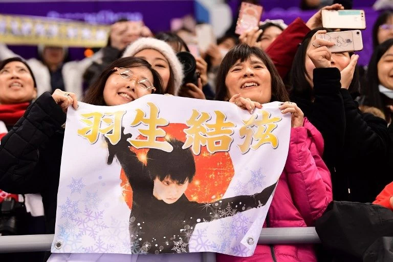 有接近上百日本迷姐遠到韓國為羽生結弦助陣。法新社