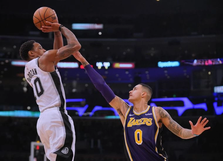主力得分手迪羅尚(DeMar DeRozan,左)近期火力全開。法新社