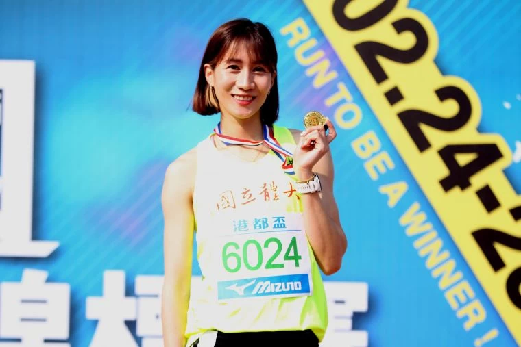 公開女400公尺跨欄決賽,國體大羅佩琳以1:02.98再破大會。林嘉欣/攝影。