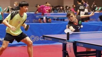 李昱諄/張佑安以分組冠軍晉級混雙16強賽。姚瑞宸攝