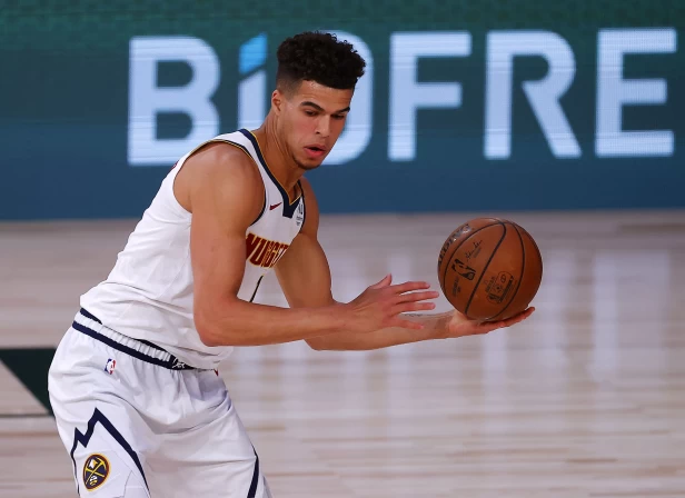 金塊前鋒波特(Michael Porter Jr.),在季後賽已有8戰搶下10個以上籃板。法新社