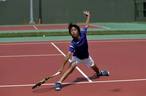 14歲組男單詹程睿滑步救球。海碩整合行銷提供