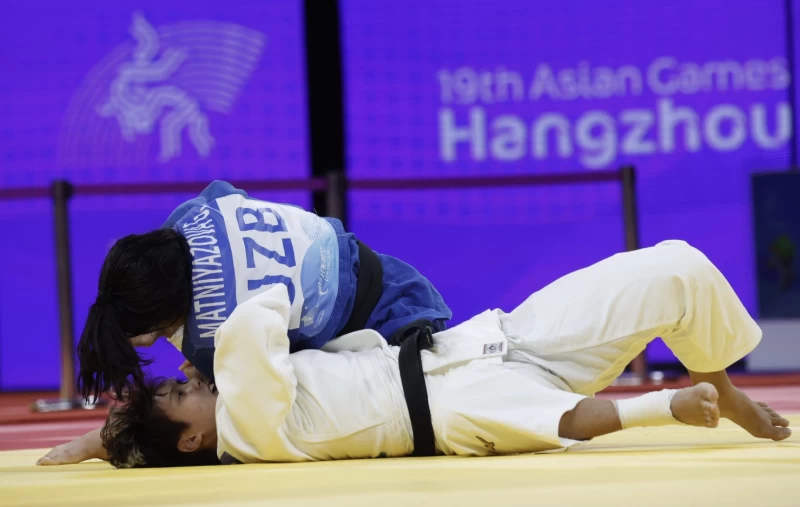 銅牌戰廖宇蓉被烏茲別克女將馬特尼亞佐娃(Gulnoza Matniyazova)壓制後落敗。中華奧會提供
