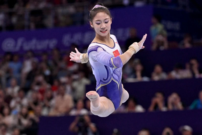 在亞運體操女子全能摘金後,左彤自信「顏值與實力」並存!法新社
