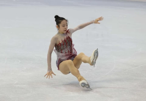 蔡玉鳳在3圈後內點冰跳(Flip jump,菲力普跳)發生失誤摔倒。李天助攝