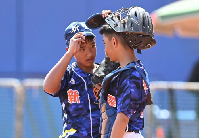 松以勒(左)和金承昊投捕合作。台灣世界少棒聯盟提供