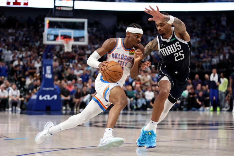 亞歷山大(Shai Gilgeous-Alexander,左)關鍵時刻無解的中距離進球是客勝的要素。法新社