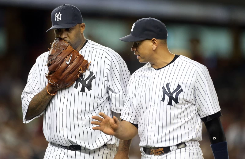 沙巴西亞（CC Sabathia，左）就偷偷爆料前隊友基特。法新社