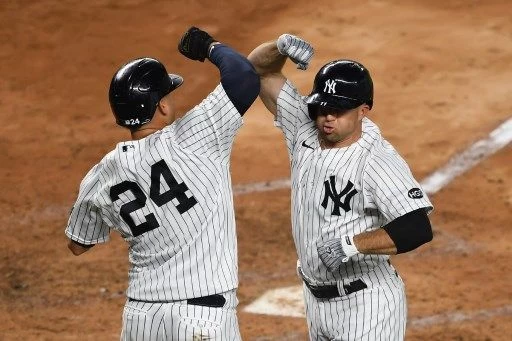 持續神隱的賈納(Brett Gardner,右)這次依舊不會出席。法新社