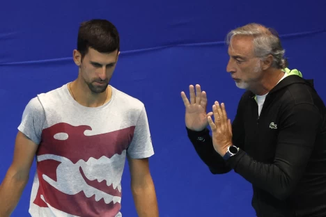 喬科維奇(Novak Djokovic)的前教練帕尼奇(Marco Panichi,右)竟然準備加盟辛納的團隊。法新社