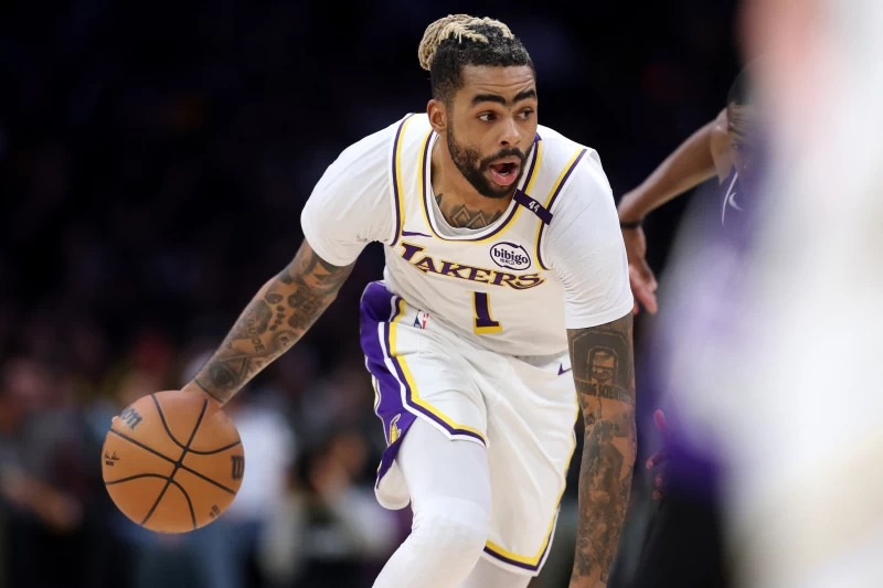 控衛羅素(D'Angelo Russell)開心被交易到籃網。法新社