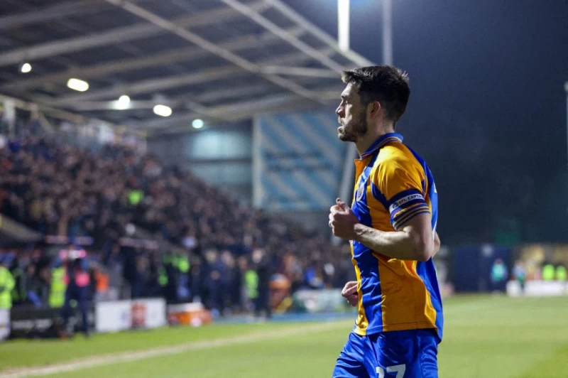 英甲的舒士貝瑞城(Shrewsbury Town)前鋒馬奎斯(John Marquis)13秒就拿到紅牌。法新社