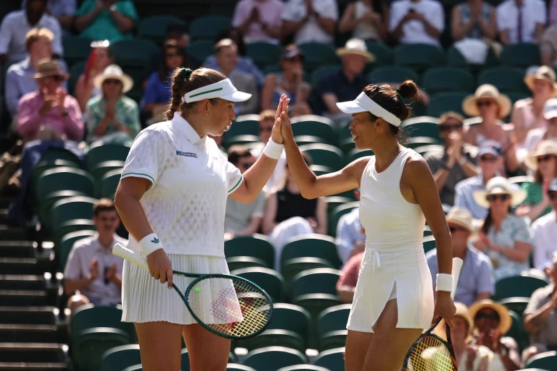 謝淑薇/奧絲塔朋科(Jelena Ostapenko,拉脫維亞)組合可溫網屈居亞軍。法新社