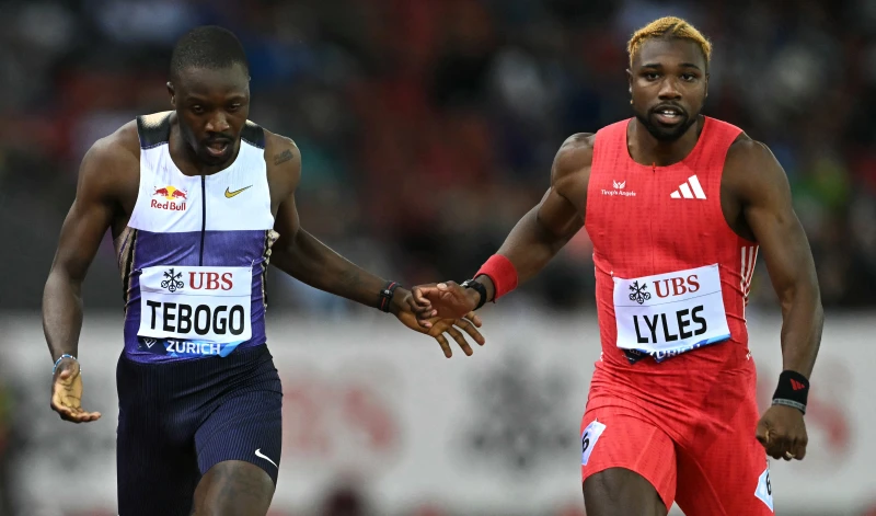 美國短跑名將萊爾斯（Noah Lyles，右）以0.02秒些微差優勢力壓波札那的2024年奧運冠軍泰博格（Letsile Tebogo）摘金。法新社