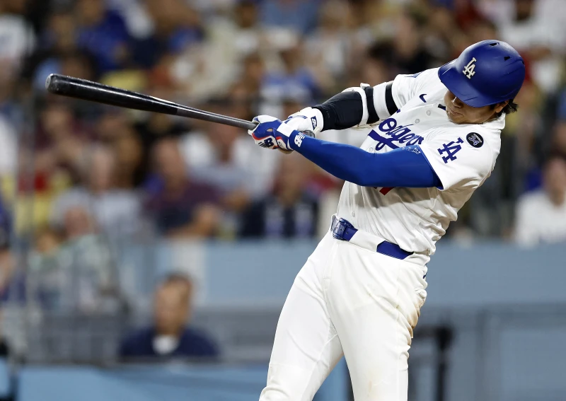 大谷翔平今天二刀流登板，成為史上第一位單季50轟、50次三振的球員。法新社