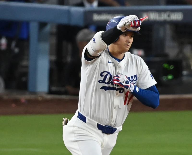 洛杉磯道奇大谷翔平今在生涯首次在季後賽單場擊出2支全壘打。法新社