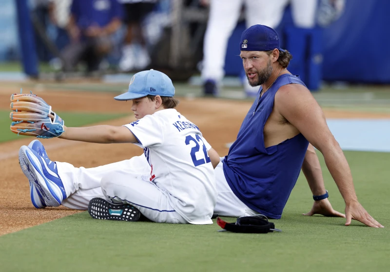 洛杉磯道奇球星柯蕭（Clayton Kershaw）的大兒子查理（Charley Kershaw，前）。法新社