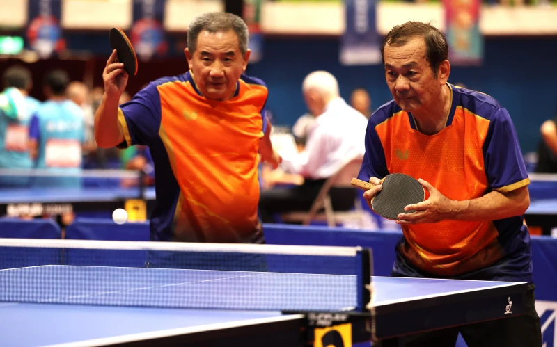 陳士群/劉文良(右)在樂活黃金140雙打獲亞軍。台灣乒乓球總會 提供