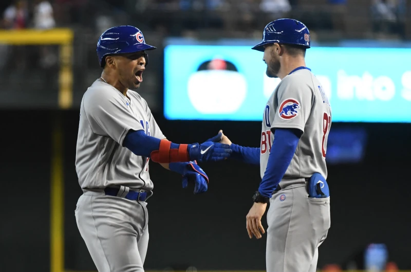 邁阿密馬林魚近日做出教練團異動,現年37歲的「司機」德賴弗(Craig Driver,右)即將擔任球隊的一壘教練。法新社