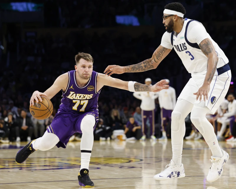 唐西奇今天拿下35分、11助攻。法新社