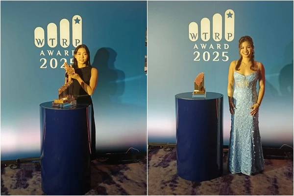 獲百萬獎金的游泳選手韓安齊(右)、張雅佳盛裝出席。詹健全攝