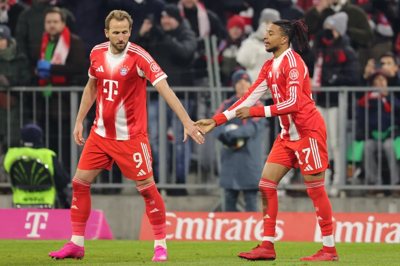 拜仁慕尼黑前鋒哈里·凱恩(Harry Kane,左)再創下紀錄。法新社