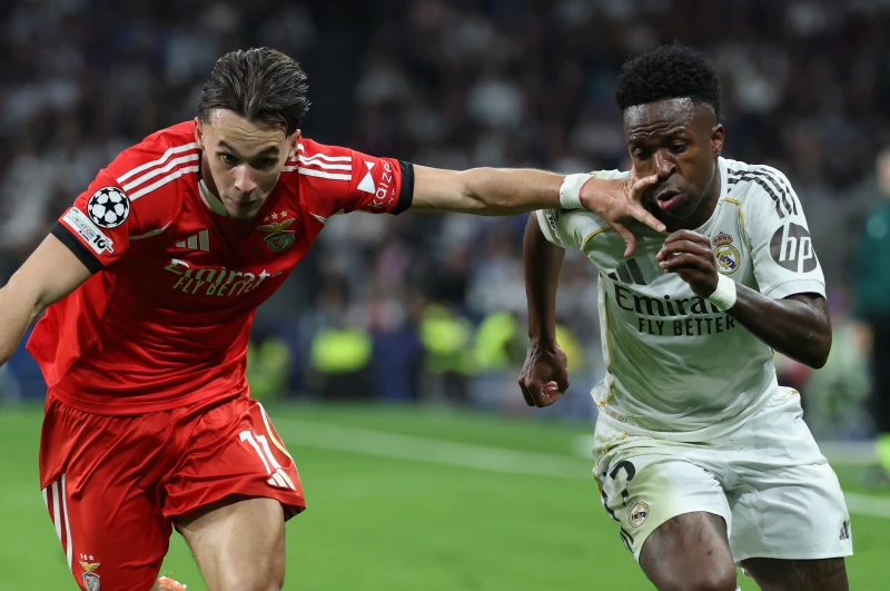 受到種族歧視風波的巴西前鋒維尼修斯(Vinicius Junior，右)射進致勝球。法新社