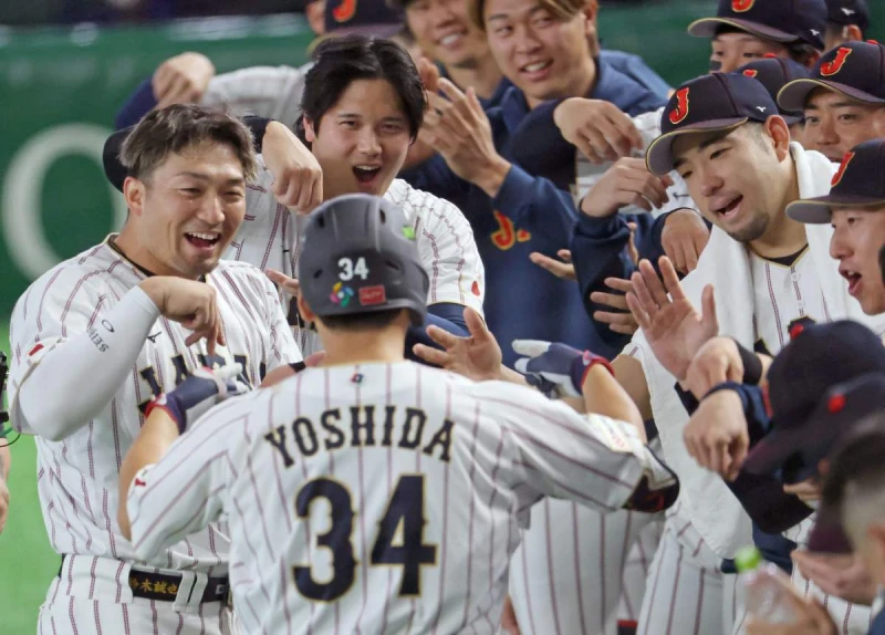 日本靠著吉田正尚七局兩分砲才逆轉領先。法新社