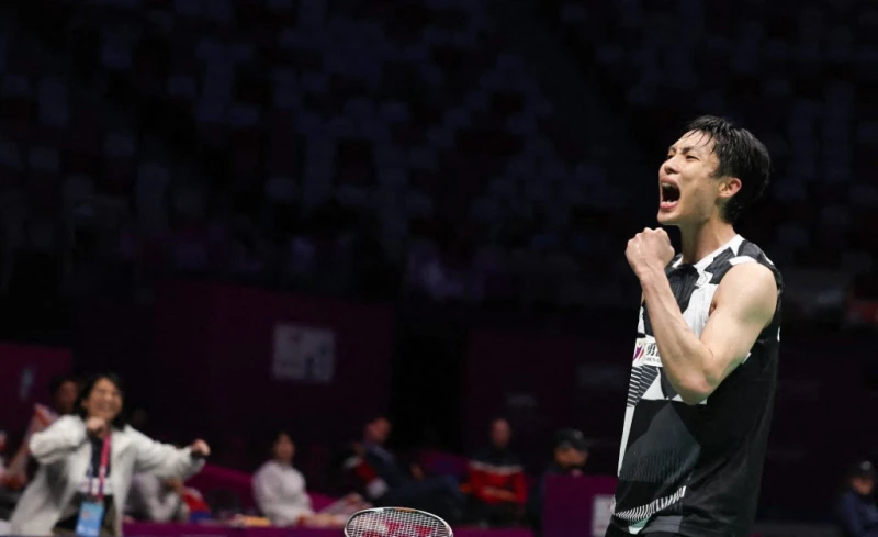 周天成復仇晉亞錦16強。法新社