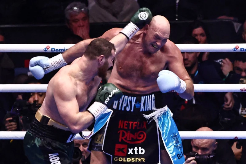 前世界重量級拳王弗里(Tyson Fury,右)歷經12回合激戰後獲勝。法新社