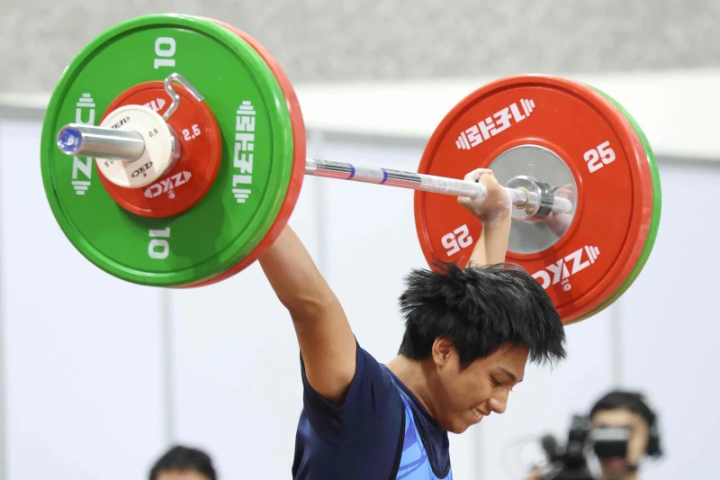 柯優助對舉重有說不出的堅持。台南市體育局提供