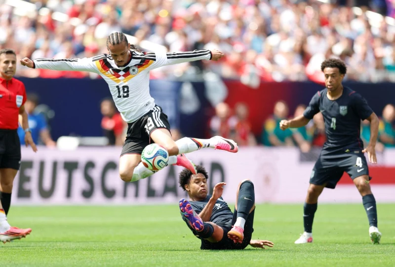薩內(Leroy Sane=,上)為德國射進致勝球。法新社