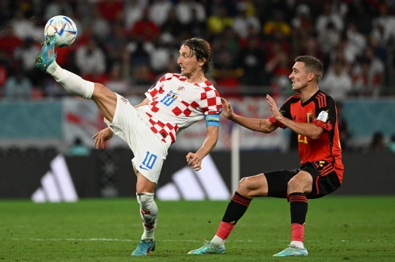 克羅埃西亞中場由莫德里奇 (Luka Modrić,左) 坐鎮,掌控比賽節奏能力舉世聞名。法新社